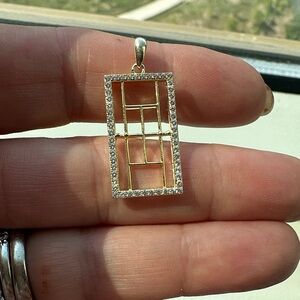 Elegant Goldtoned and rhinestone tennis court Pendant
